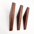 Three Walnut Wall Hooks - &3