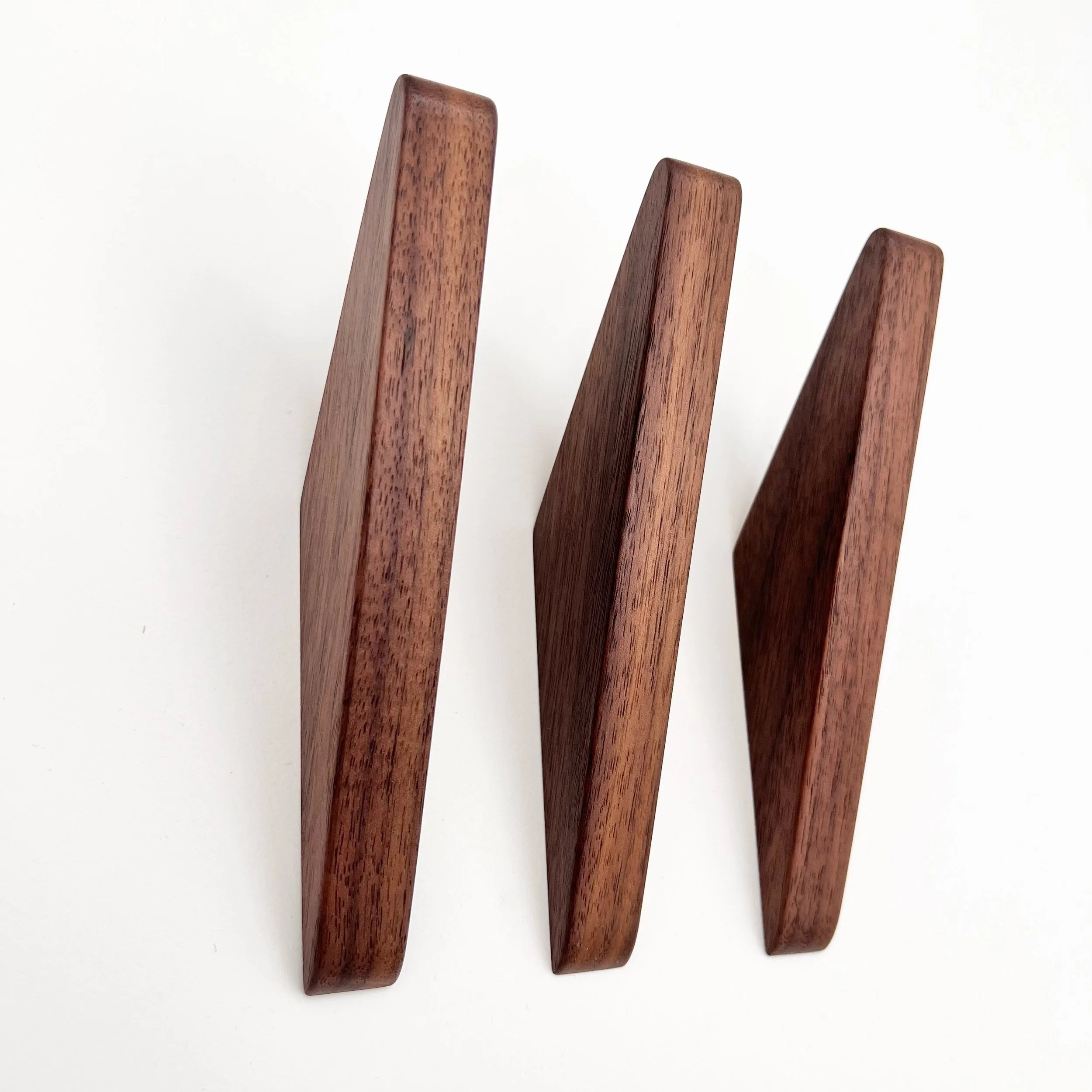 Three Walnut Wall Hooks - &3